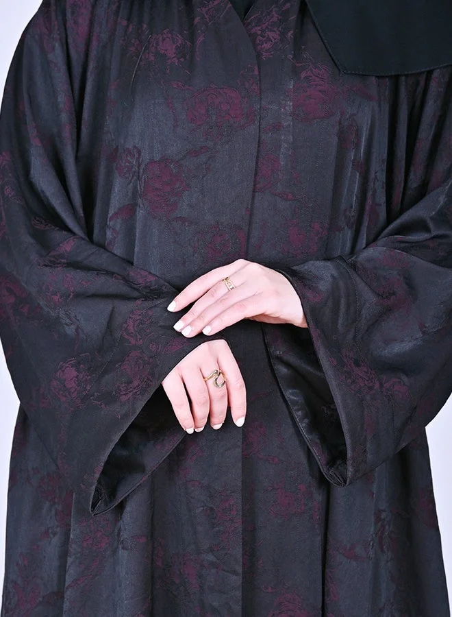 عبايات حوراء عباية لف كلوش وكم واسع بقماش صيفي منقش بزهور عنابية