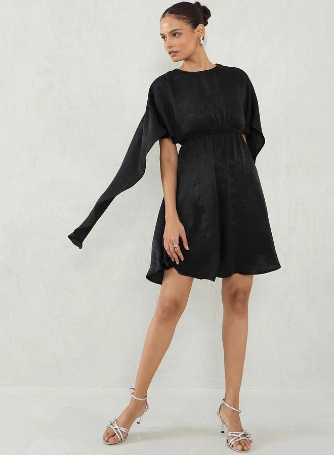 Femmella  Black Satin Cape Sleeve Mini Dress for Women | Best Price UAE