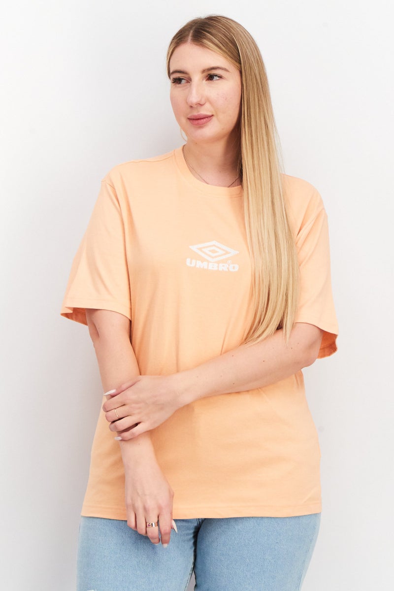 umbro Women Sportswear Fit Short Sleeve Embroidered Logo Top, Gelato/White - Image 1
