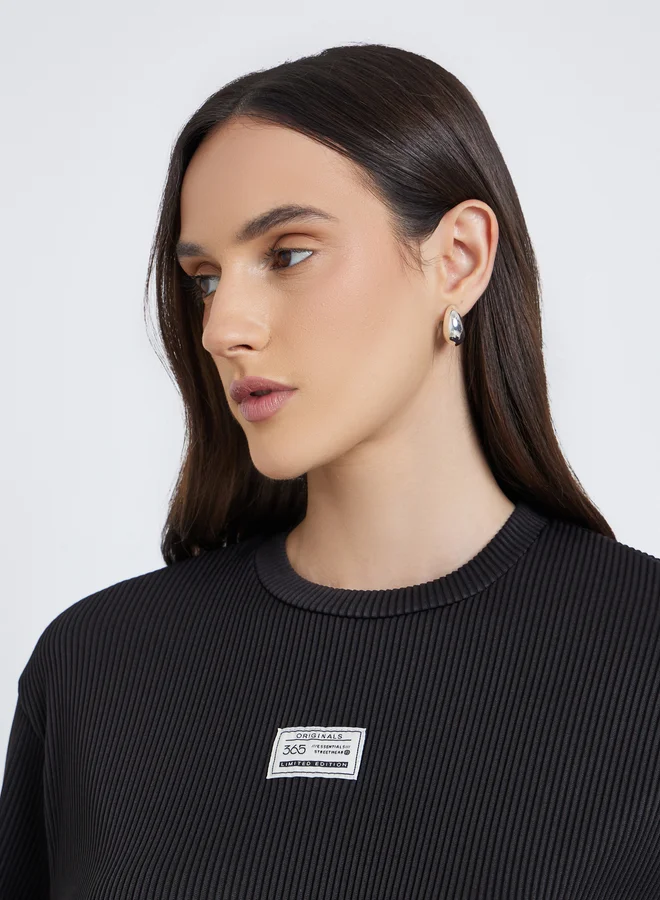 Styli Women Black Ribbed Oversized T-Shirt