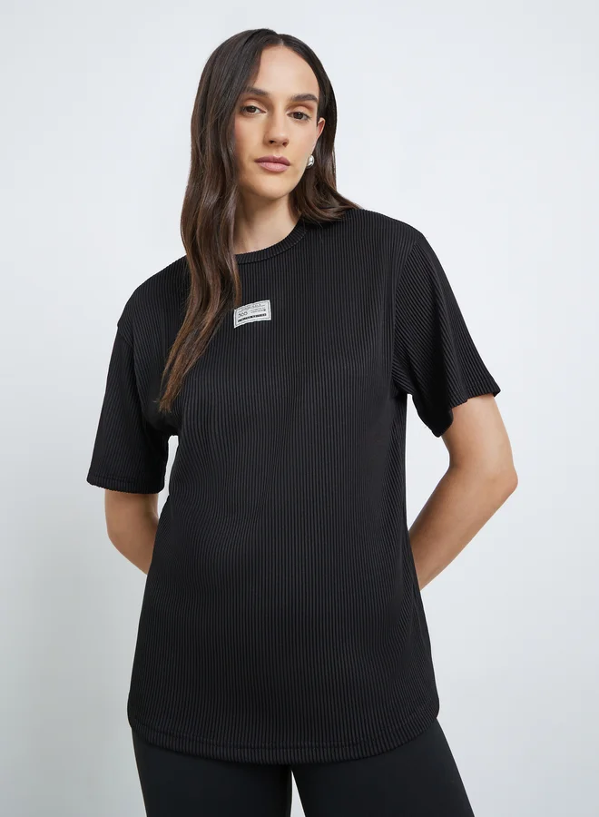 Styli Women Black Ribbed Oversized T-Shirt