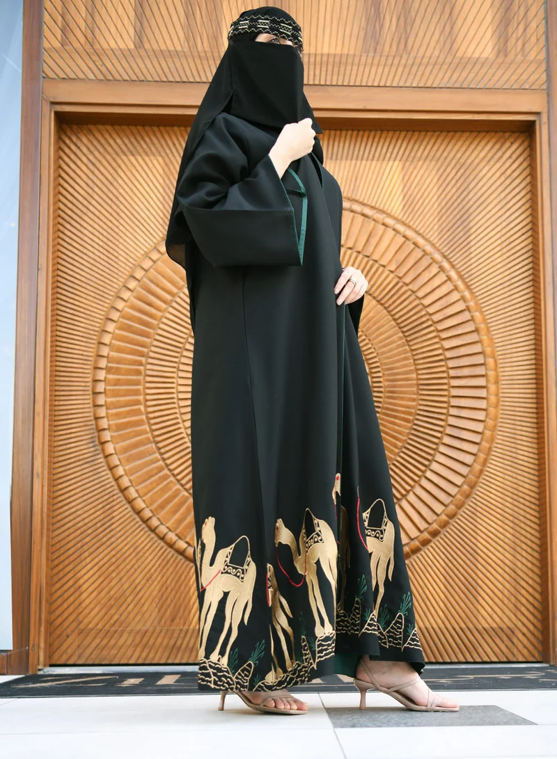 HAWRAA ABAYA Black wrap abaya with Saudi National Day design, silk lining and embroidered at the bottom