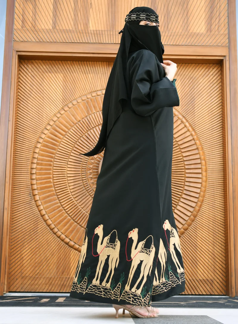 HAWRAA ABAYA Black wrap abaya with Saudi National Day design, silk lining and embroidered at the bottom
