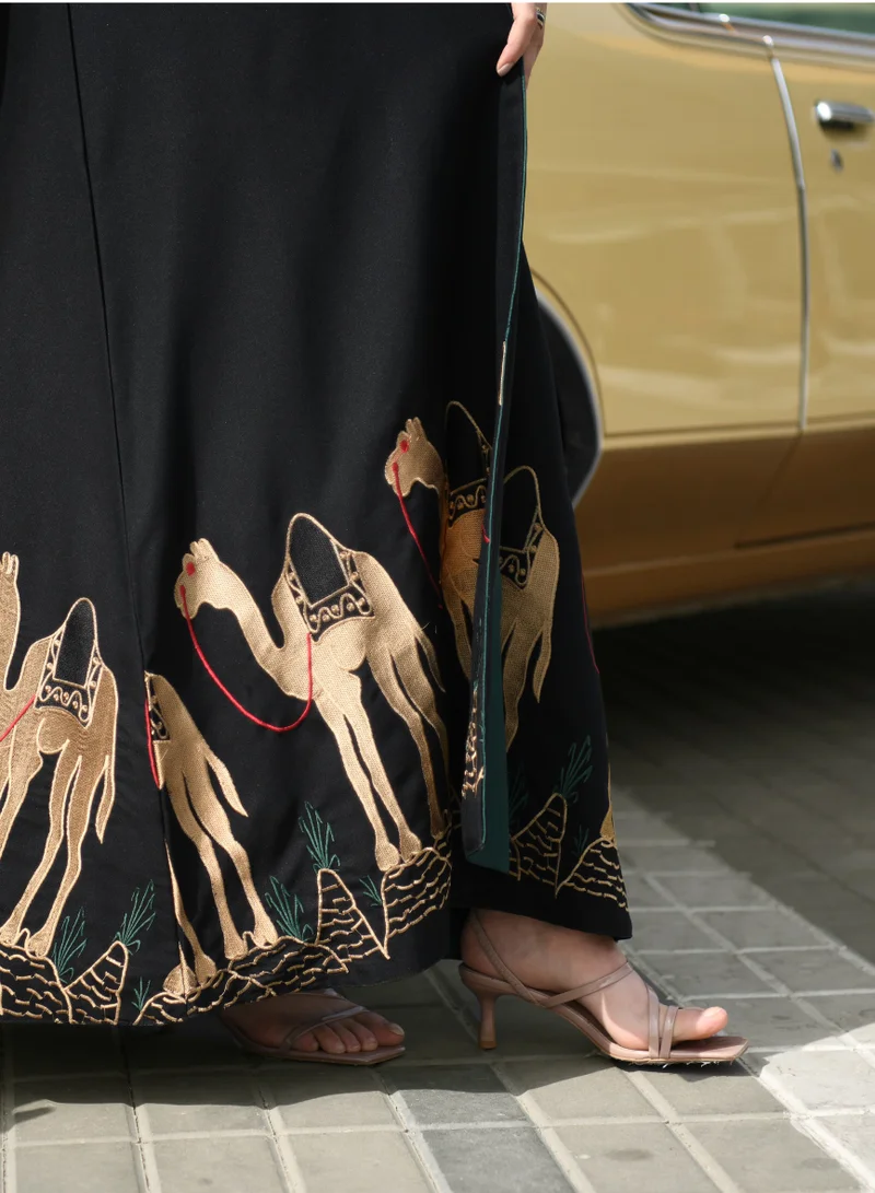 HAWRAA ABAYA Black wrap abaya with Saudi National Day design, silk lining and embroidered at the bottom