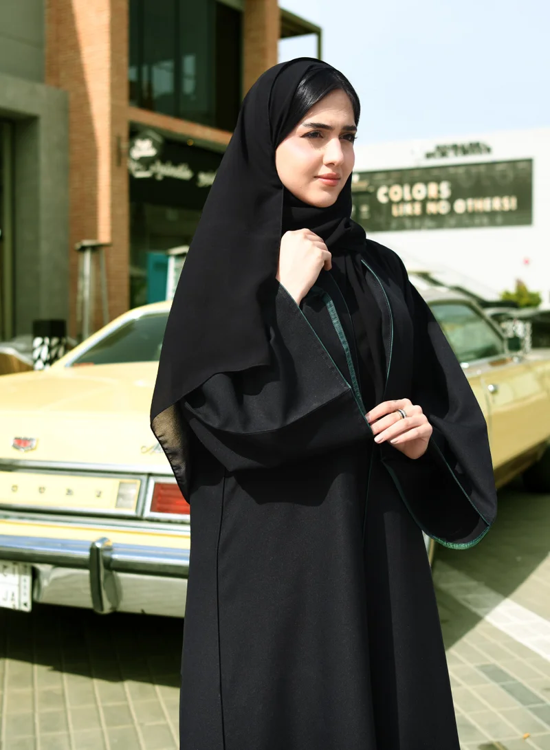 HAWRAA ABAYA Black wrap abaya with Saudi National Day design, silk lining and embroidered at the bottom