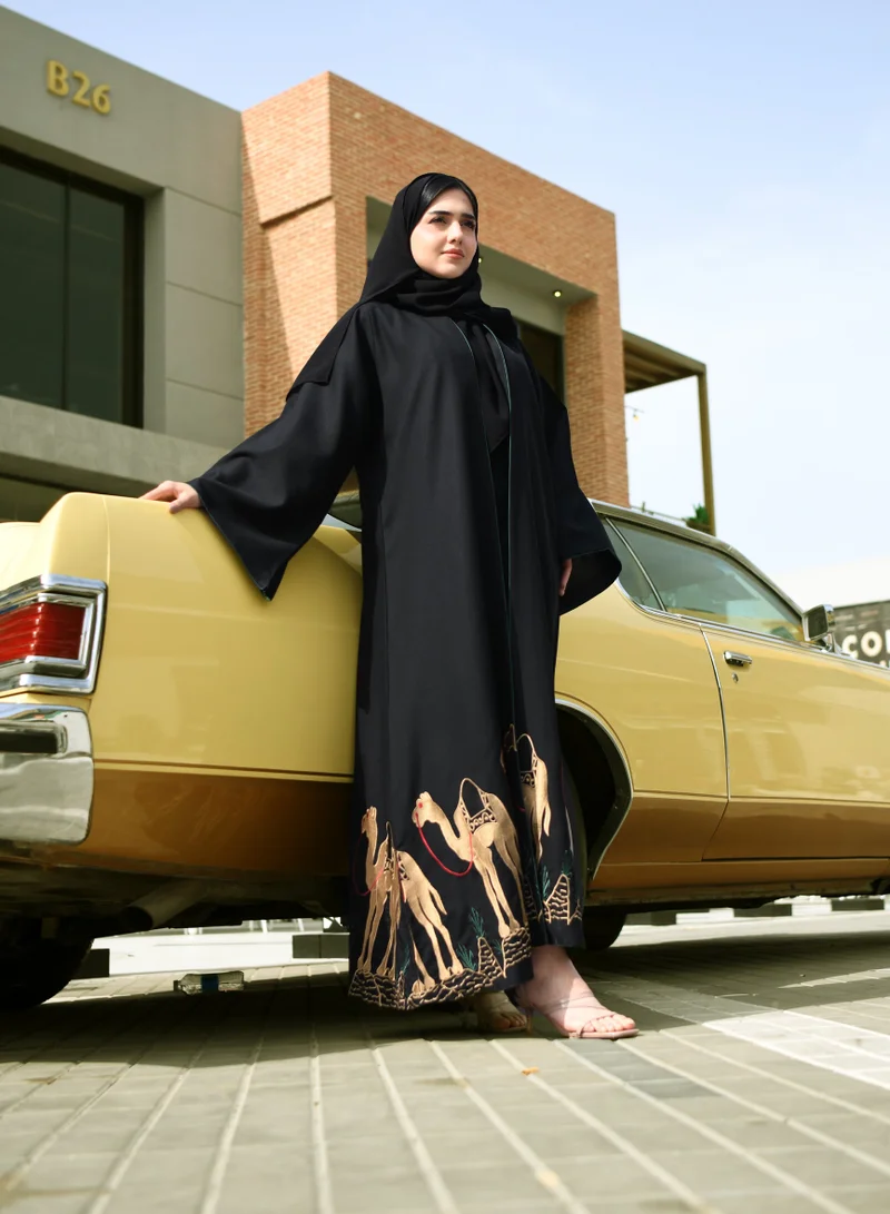 HAWRAA ABAYA Black wrap abaya with Saudi National Day design, silk lining and embroidered at the bottom