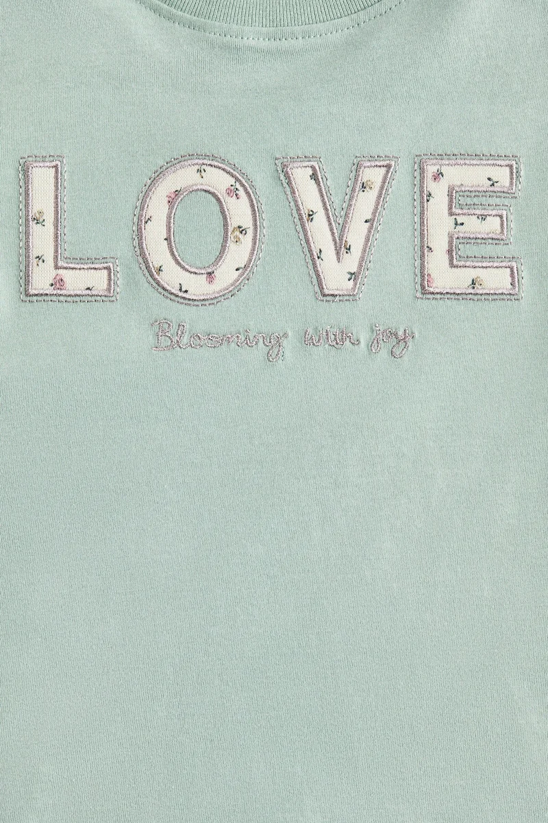 اتش اند ام تي-شيرت بتفاصيل مزخرفة