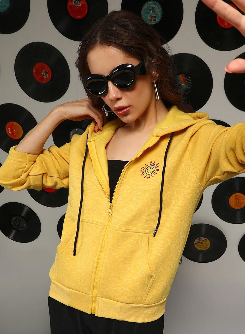 Campus Sutra Women's Saffron Yellow Zip-Front We'll Be Alright Hoodie For Casual Wear | Hooded Neck | Long Sleeves | Zipper Closure | Sweatshirt Crafted With Comfort Fit For Everyday Wear - Image 1