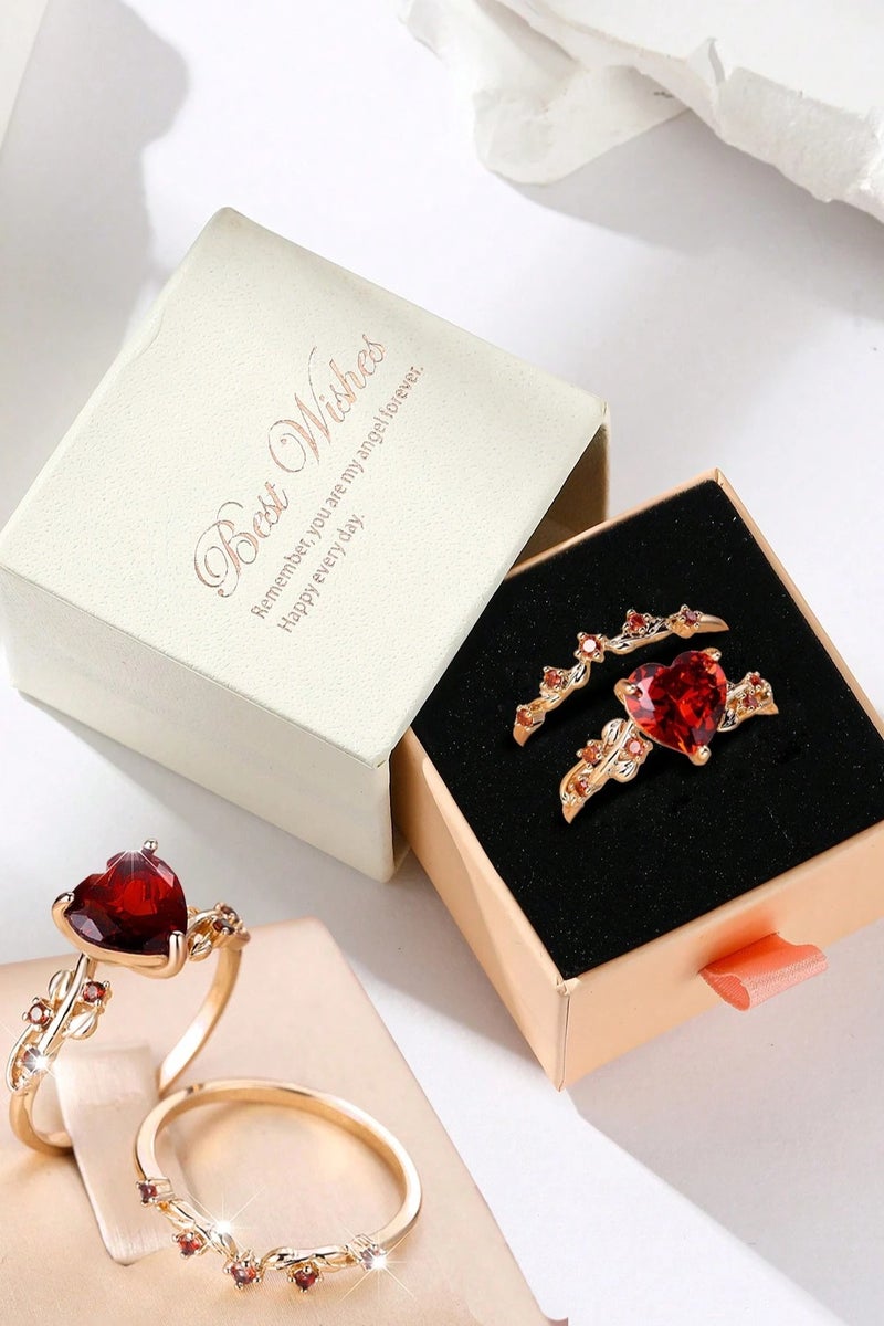 Women's Accessory – Two-Piece Gold Ring Set Embellished with Sparkling Stones and a Red Heart Design. Comes with a lovely message box, perfect as a ready-to-gift present for engagements, weddings, graduations, Mother's Day, Valentine's Day, anniversaries, birthdays, and all special occasions. Ring size: (7) - Image 1