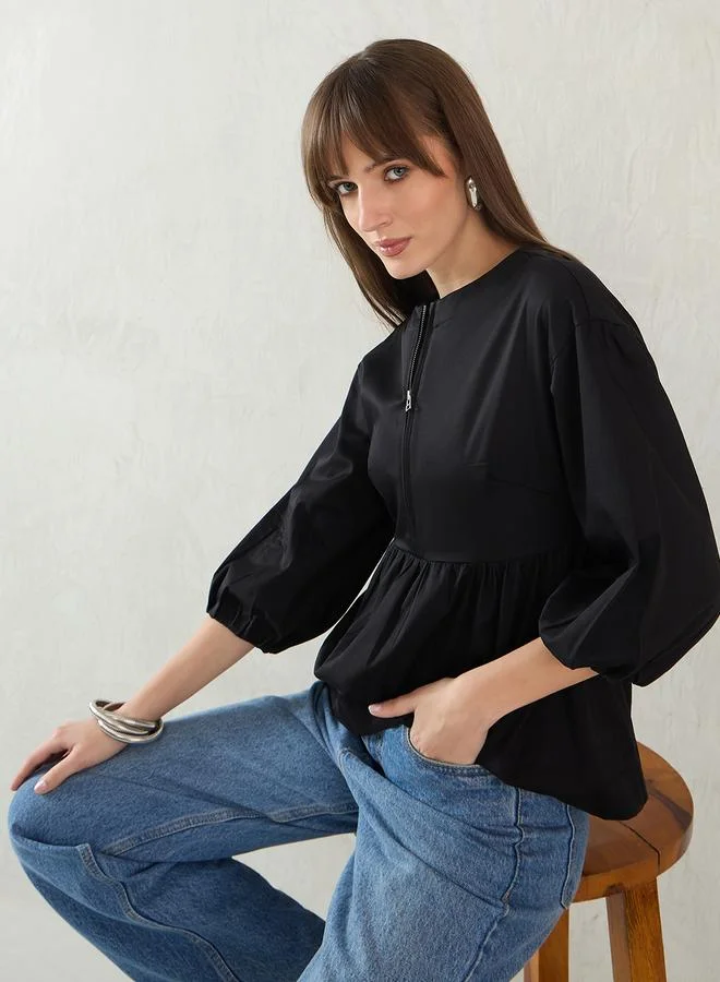 Femmella Femmella Black Cotton Half-Zip Peplum Top