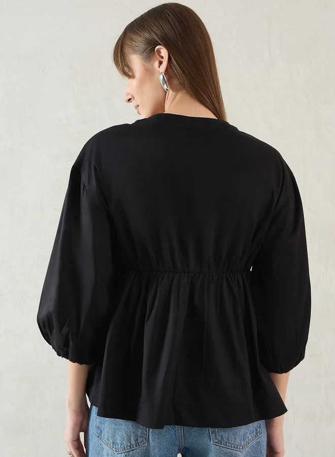 Femmella Femmella Black Cotton Half-Zip Peplum Top