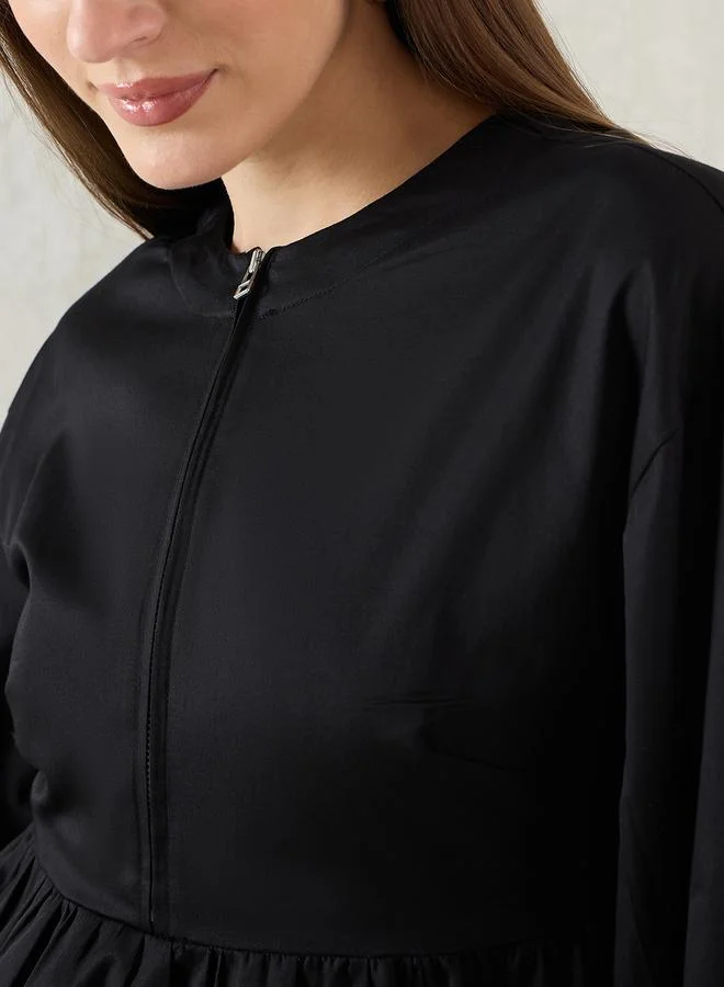 Femmella  Femmella Black Cotton Half-Zip Peplum Top for Women | Best Price UAE