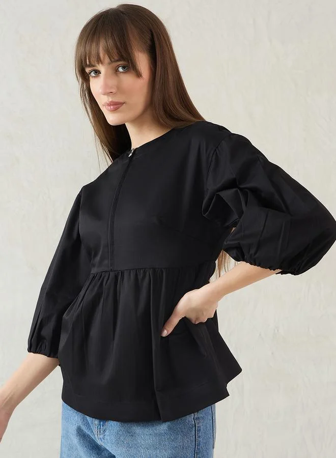 Femmella Femmella Black Cotton Half-Zip Peplum Top