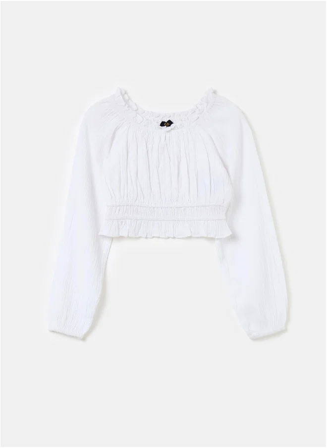 او في اس Crop blouse in crêpe with frills