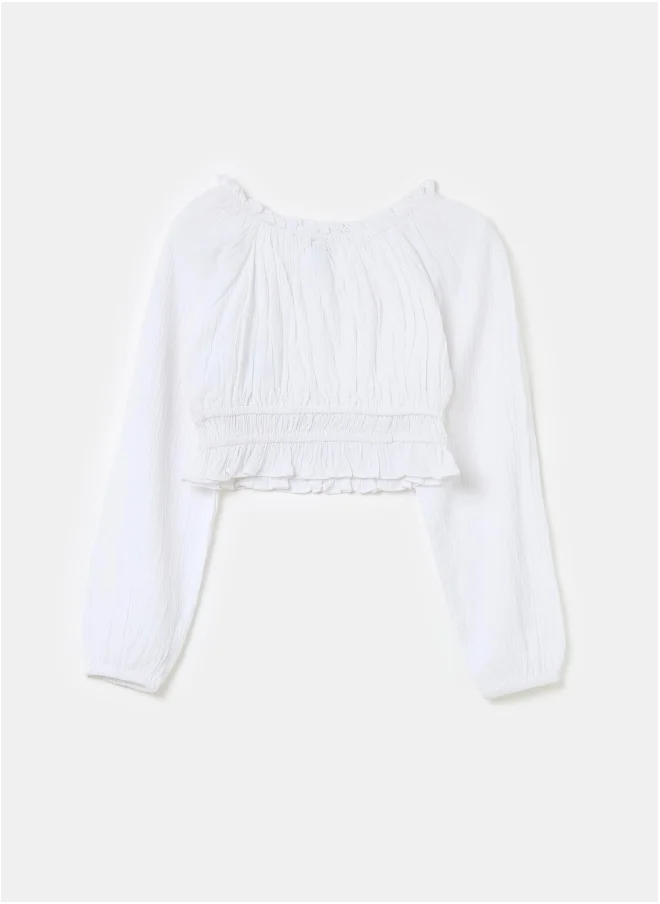 او في اس Crop blouse in crêpe with frills