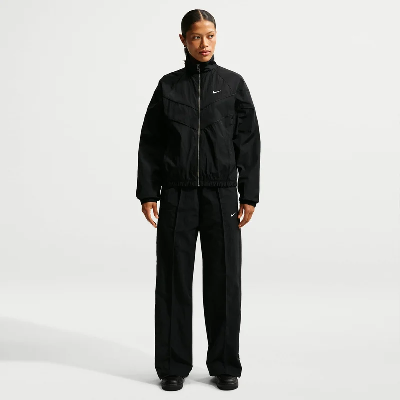 نايكي بناطيل سبورتسوير إيفريثينغ خصر متوسط الارتفاع مفتوحة من الأسفل للنساء