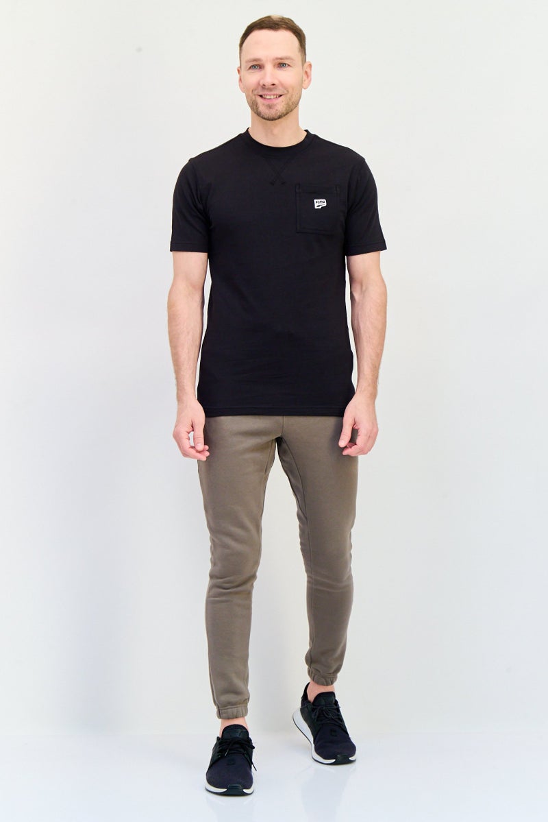 PUMA تي شيرت رجالي بقصة مريحة بأكمام قصيرة للخارج، أسود - Image 4