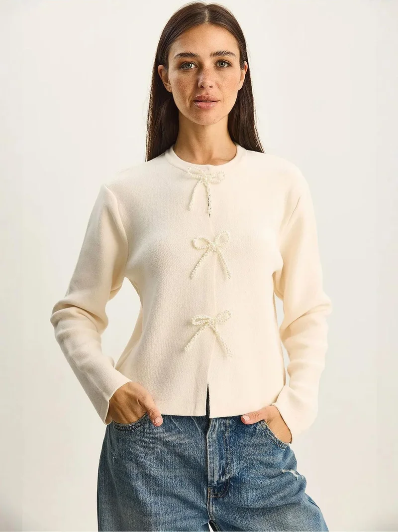 بيانكو لوتشي كارديجان محبوك بياقة دائرية وتفاصيل فيونكة