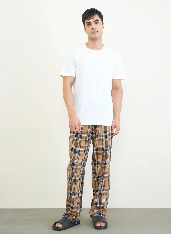Styli  Men Solid Relaxed T-Shirt and Checked Pyjama Set for Men | Best Price UAE