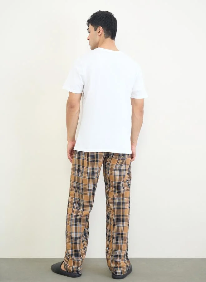 Styli  Men Solid Relaxed T-Shirt and Checked Pyjama Set for Men | Best Price UAE