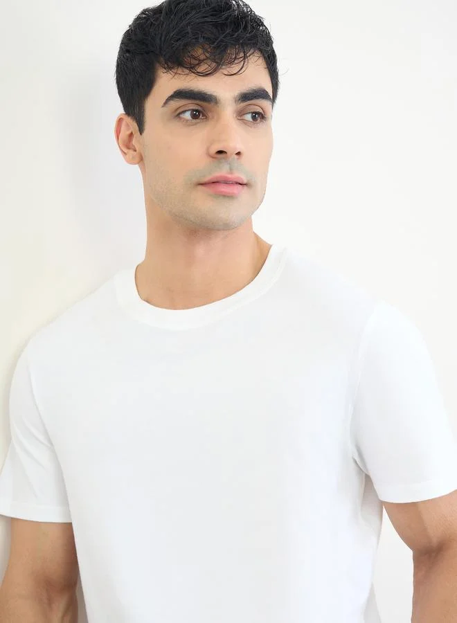 Styli  Men Solid Relaxed T-Shirt and Checked Pyjama Set for Men | Best Price UAE