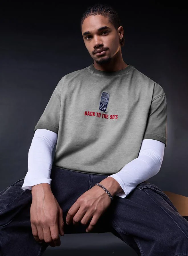 ذا سوليد ستور تيشيرت مغسول بقصة واسعة