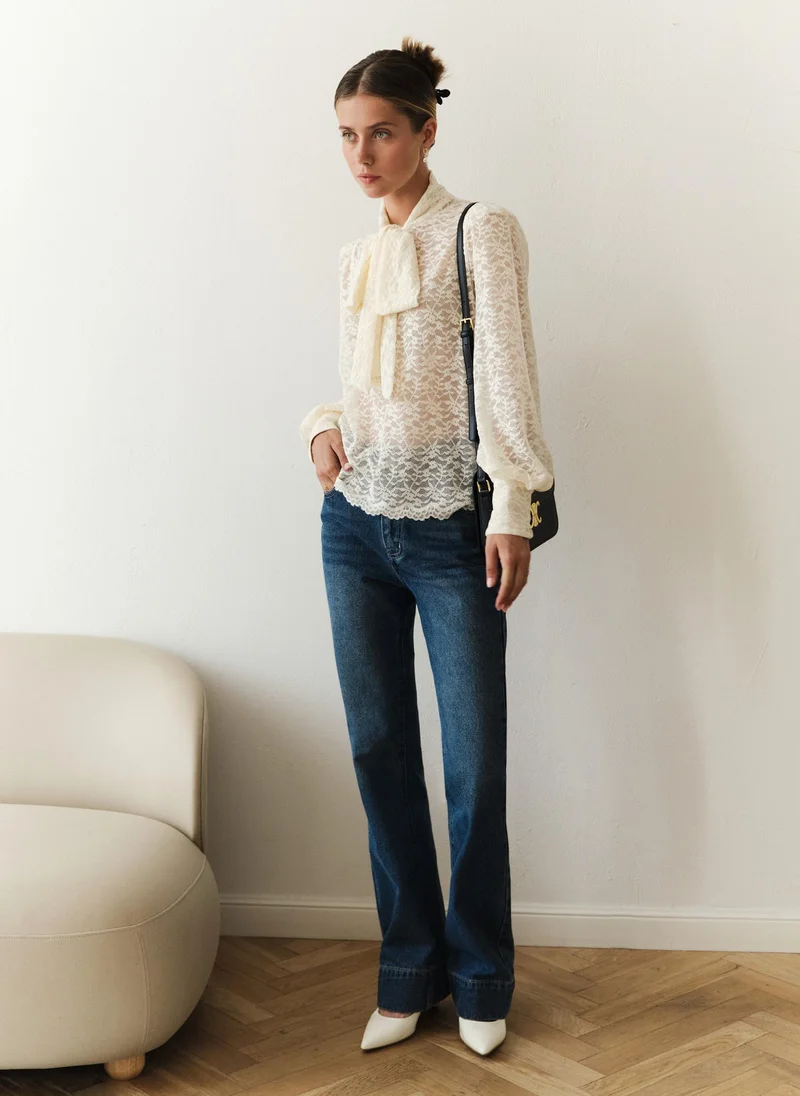 Lichi Lace blouse with a bow on the collar