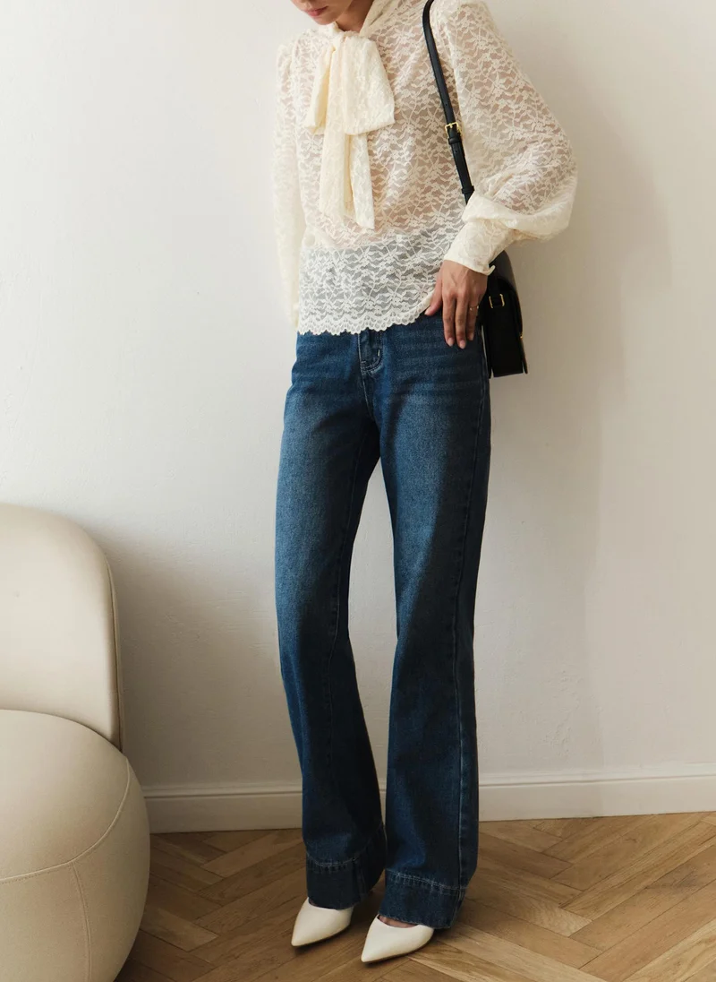 Lichi Lace blouse with a bow on the collar