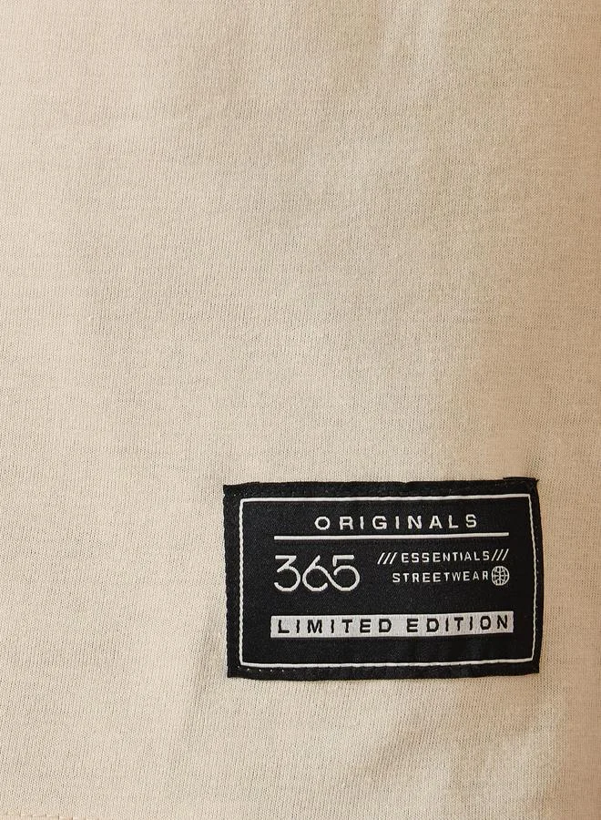 Styli Styli Contrast Panel Slogan Print Regular Fit T-Shirt with Badge Detail