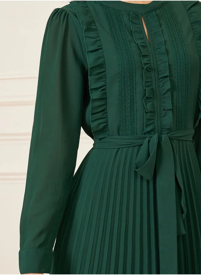 Styli Ruffle Detail Pleated A-Line Maxi Dress with Self Tie Up