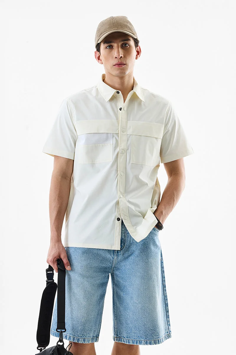 SNITCH قميص تقني بأزرار مزدوجة أوف وايت