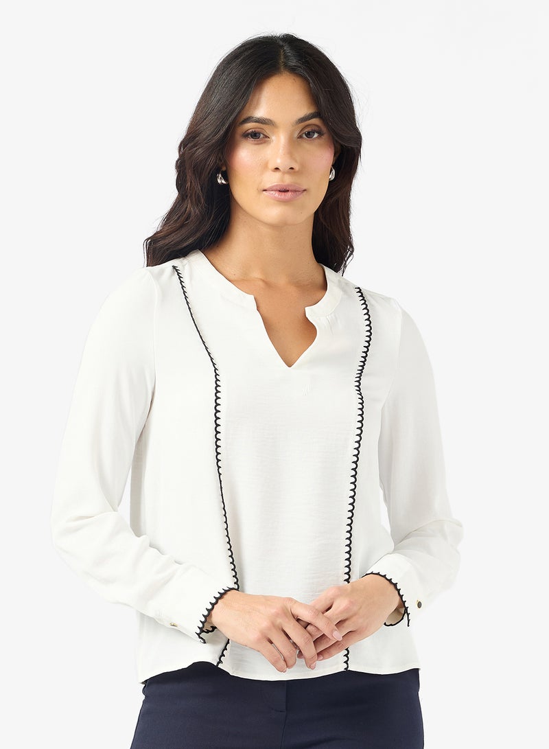 بلوزة بأكمام طويلة من فيمكونا