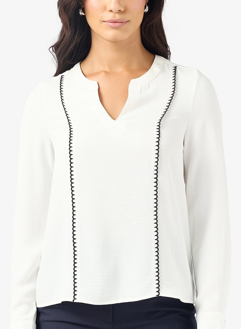 بلوزة بأكمام طويلة من فيمكونا