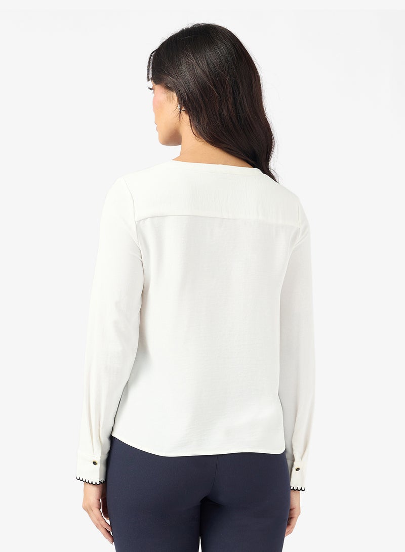 بلوزة بأكمام طويلة من فيمكونا