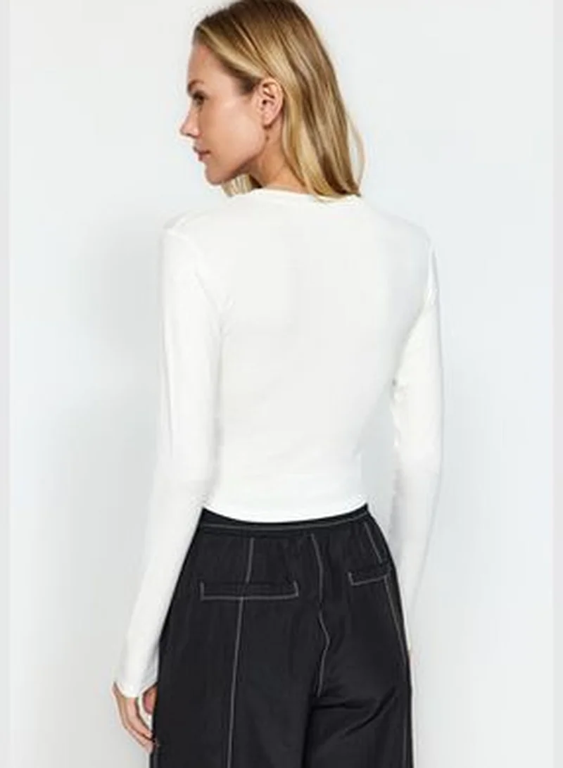 trendyol Premium Viscose Ecru Crew Neck Crop Stretchy Knitted Blouse TWOAW24BZ00116