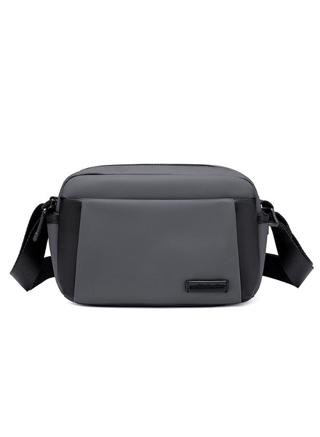 Arctic Hunter KB00943 Casual Water Resistant Crossbody Shoulder Bag for Men and Women, with Adjustable Strap, Suitable for Work and Everyday Wear. This compact and comfortable handbag features multiple storage pockets and a padded interior compartment for an 11-inch tablet or iPad. - Image 1