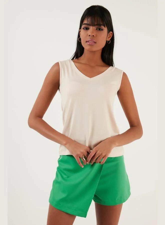 ليلا بلوزة نسائية بياقة على شكل حرف  وأشرطة عريضة