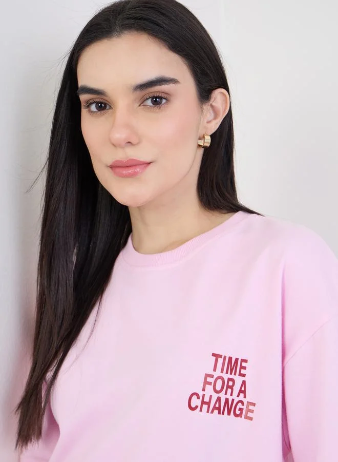 Styli  Pink Oversized Slogan Print T-Shirt for Women | Best Price UAE