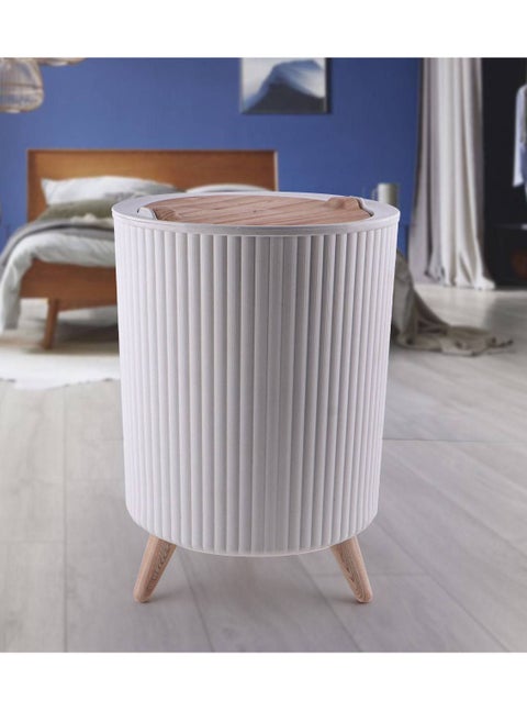 Multi-purpose wastebasket designed to be used in different places Available in white Z