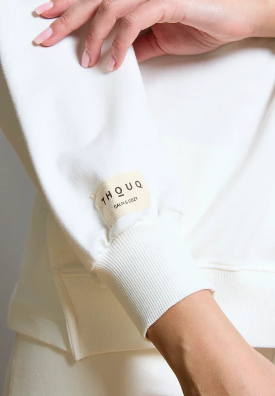 Thouq Asymmetric Hemline Extended Side Seam Sweatshirt