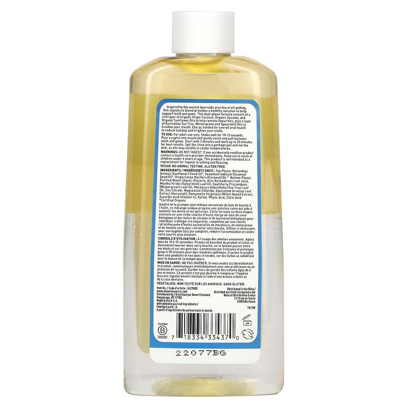 Desert Essence غسول فم مزدوج المرحلة بزيت جوز الهند من ديزرت إيسنس، نعناع، 8 أونصات سائلة - خالي من الكحول، خالي من السكر، خالي من الجلوتين، نباتي، غير معدل وراثيًا - زيت جوز الهند العضوي البكر، زيت السمسم، زيت عباد الشمس وزيت شجرة الشاي - Image 2