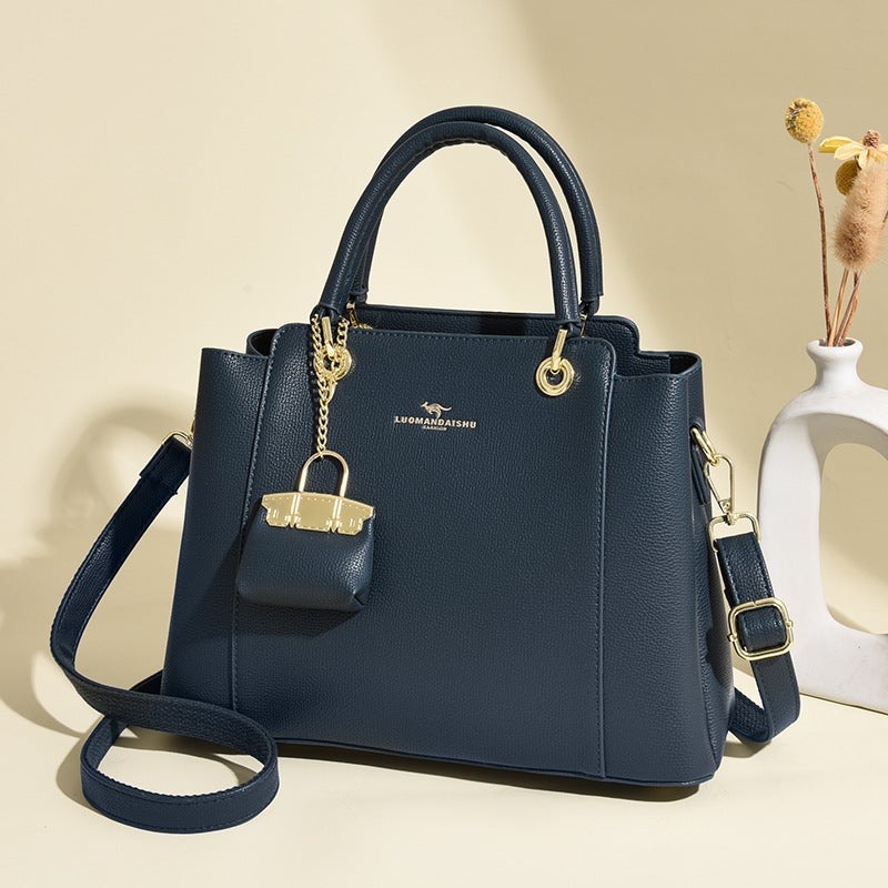 Women's Bucket Handbag with Top Handle and Crossbody Strap - Image 3