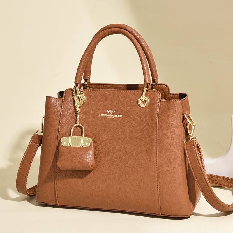 Women's Bucket Handbag with Top Handle and Crossbody Strap - Image 2
