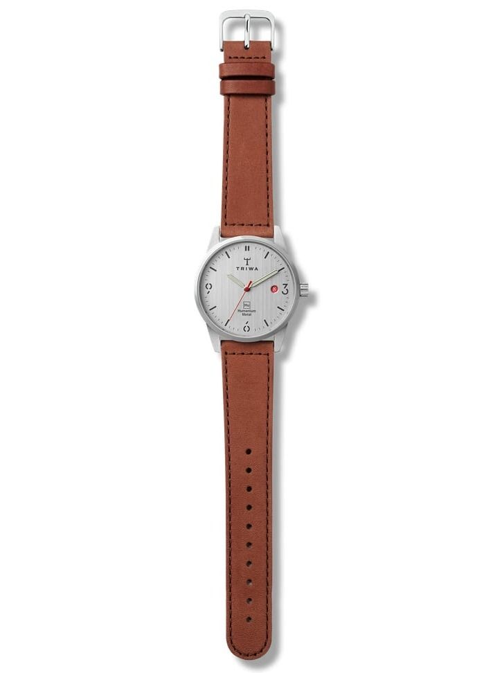 TRIWA Humanium 39 Brown Sewn Color Classic Unisex Watch Quartz Movement 5 atm Water Resistant Humanium Metal Case Tanned Leather Strap Polished Buckle Ladies Womens Fashion