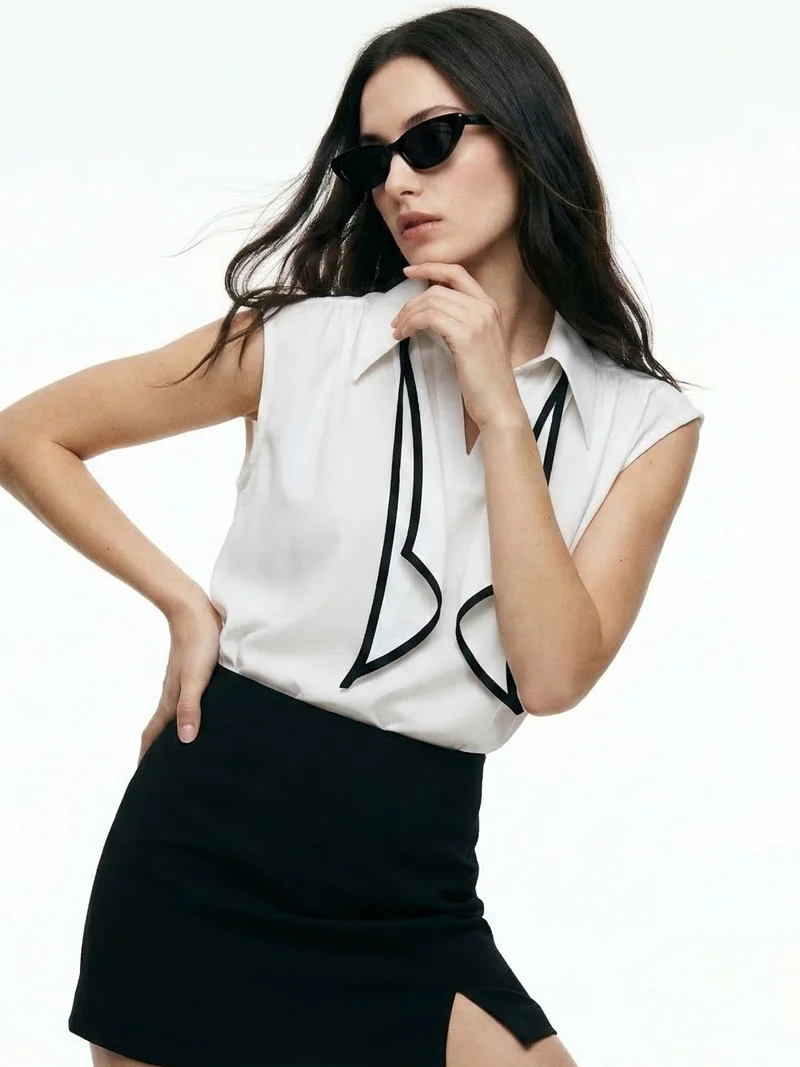 Outzidr  Off White Sleeveless Tie-Neck Blouse for Women | Best Price UAE