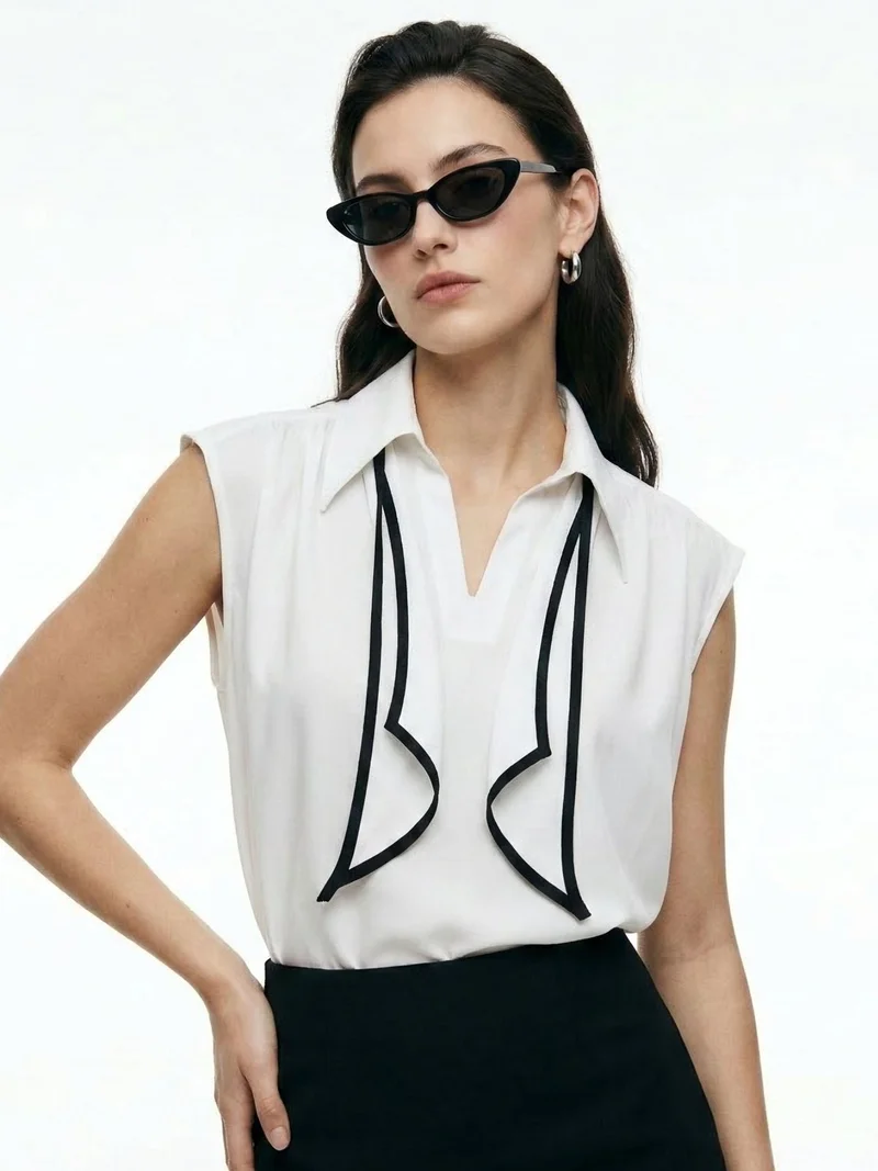 Outzidr  Off White Sleeveless Tie-Neck Blouse for Women | Best Price UAE
