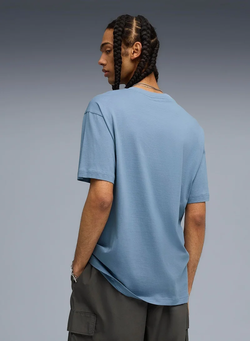 PUMA Graphic Super World Tour Relaxed T-Shirt