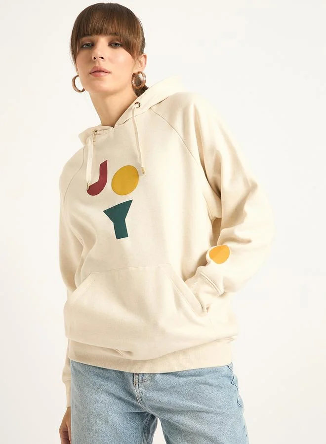 فيميلا هودي فليس كريمي بأكمام راجلان مطبع بجرافيك