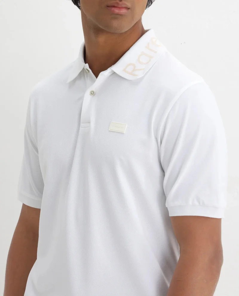 Rare Rabbit Men's Silicon Badge Classic Solid Polo