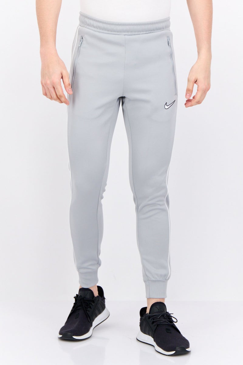 Nike سروال تدريب قياسي للرجال، رمادي - Image 1